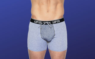 A man wears gray UFM pouch underwear for comfortable ball support