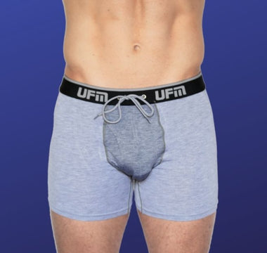 A man wears gray UFM pouch underwear for comfortable ball support