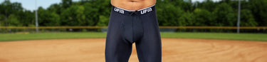 A man wears UFM pouch underwear on baseball field to prevent chafing and keep cool.