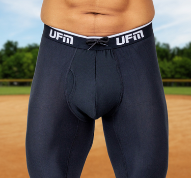 A man wears black UFM pouch underwear while playing baseball to stay cool and comfortable